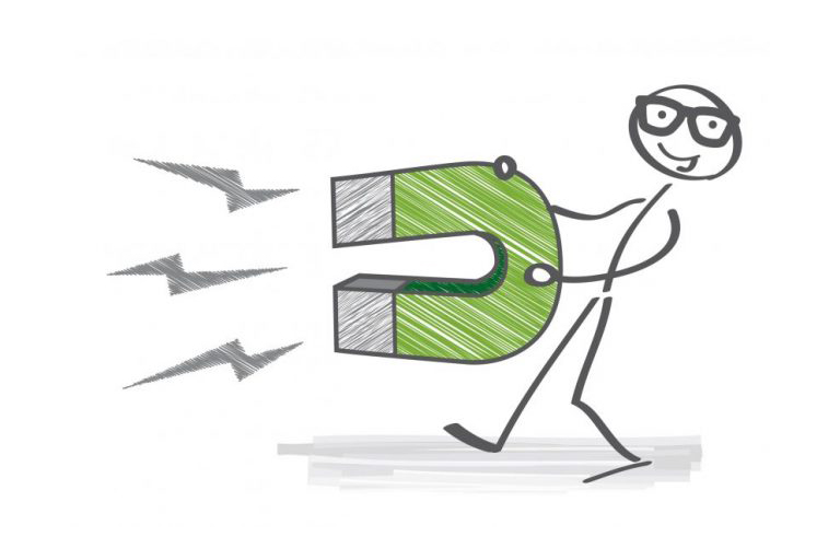 Stick figure holding a magnet